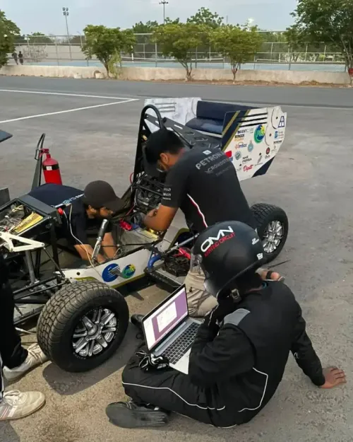 NUST Formula Student Team working on their formula-style vehicle